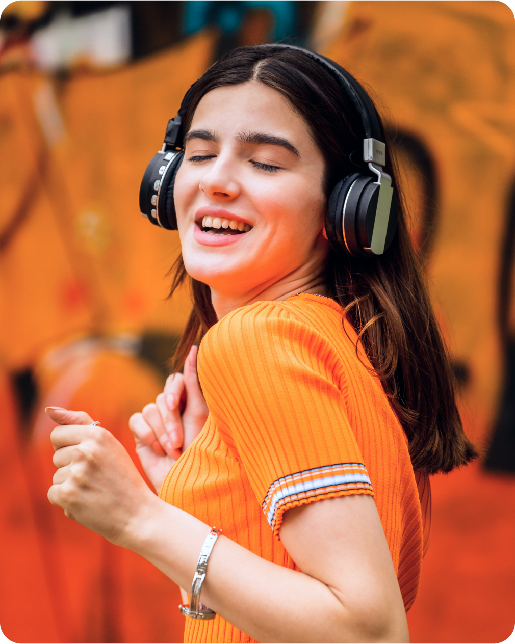 Woman enjoying music with headphones.